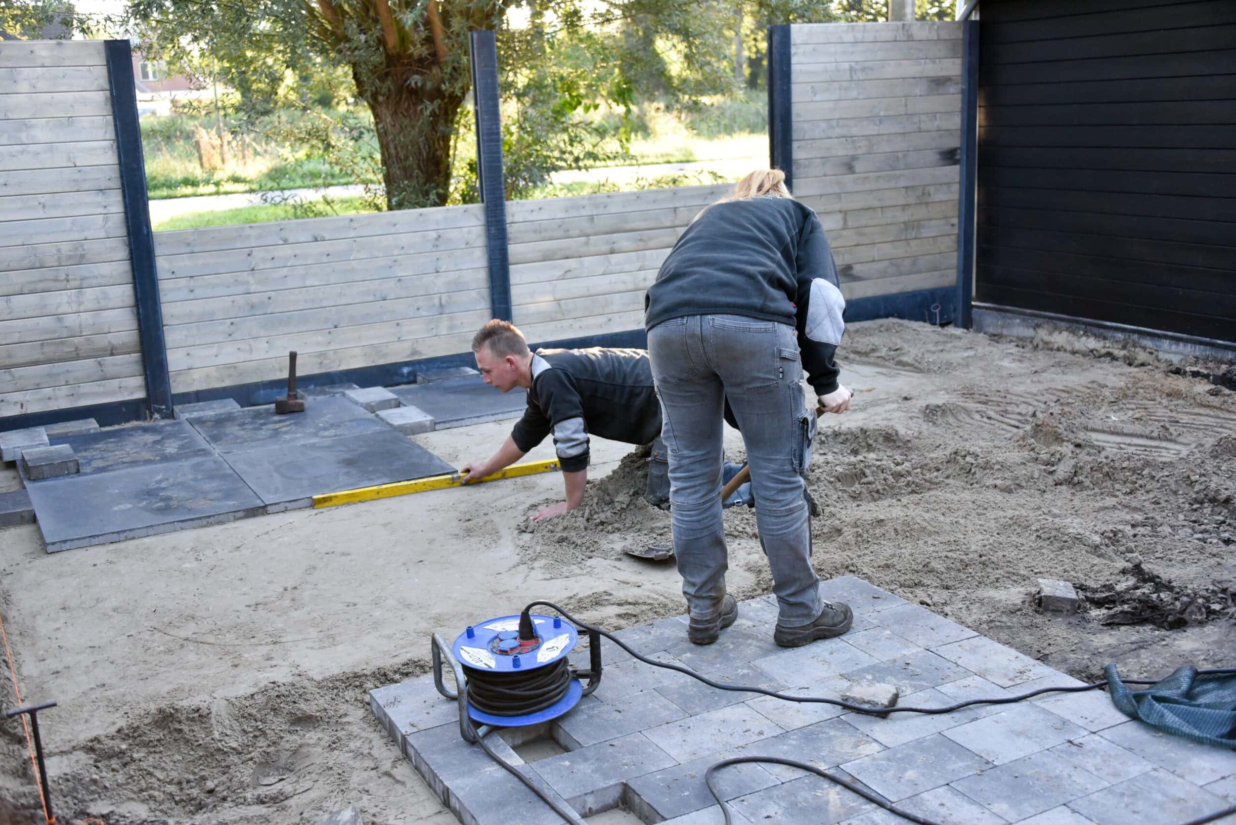 terras laten aanleggen